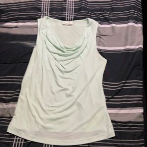 Mint green ruffled sleeveless blouse